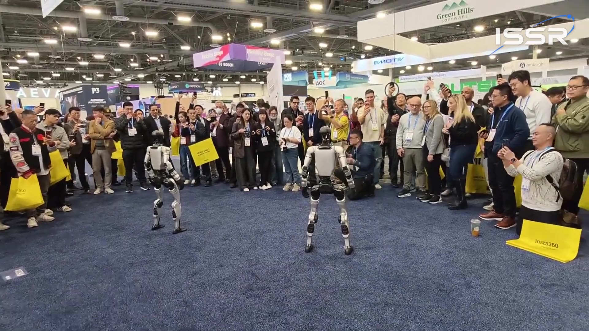 Humanoid drawing a crowd at an exhibition